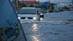 Car driving through flood